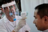 Thai barber during the Covid-19 pandemic